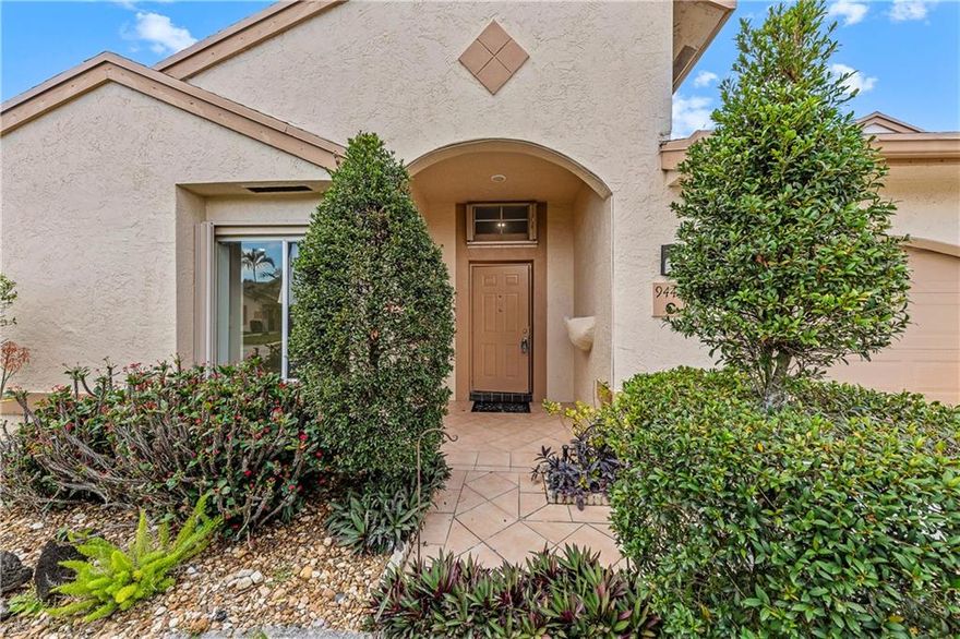 Tastefully remodeled home in Boca Gardens! 2 bedrooms, 2 bathrooms, and 1 car garage home with an open living concept. This design along with stainless steel appliances, a pantry, subway tile backsplash, stone countertops, and even a custom wine rack make this the perfect kitchen for anyone looking to entertain in their home. The home has chic finishes throughout with gray and white tones, neutral tile and modern fixtures. Accordion shutters throughout and a courtyard-style screened patio overlooking fruit trees and greenery. Great community, with gates being installed soon (already been paid for), pool, tennis courts and more. EXCELLENT LOCATION near shopping, dinning, major roadways and in A+ School zone.