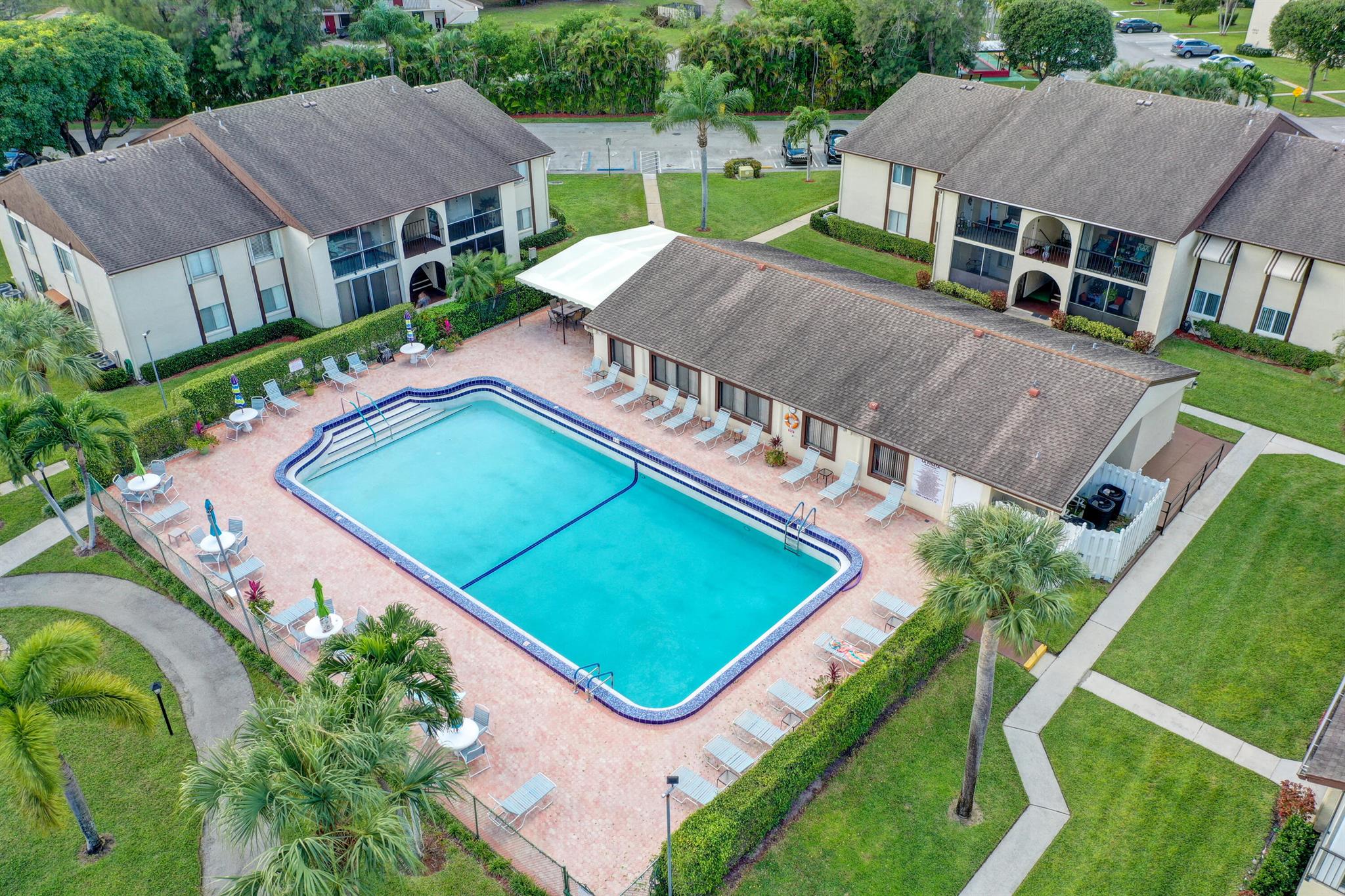 Welcome to this charming 2-bedroom, 1.5-bath condo with a relaxed coastal feel, located in a desirable 55+ active community in Greenacres. This home is being offered fully furnished, making it move-in ready and perfect for seasonal or year-round living. The bright interior opens to a beautiful lanai view, ideal for enjoying your morning coffee or evening breeze. Conveniently situated near shopping, dining, the Florida Turnpike, and Palm Beach International Airport, this home blends comfort with accessibility. Residents of this well-maintained condo & community enjoy an active lifestyle with amenities designed for relaxation and socializing.