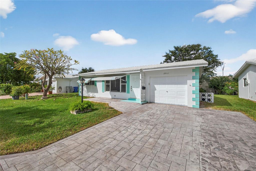 Photo of 2711 NW 4th Avenue, Pompano Beach, FL 33064 (MLS # F10533304)