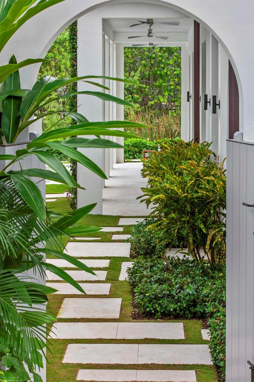 Welcome to this exquisite 4 bedroom, 4.5 bath residence, nestled within the prestigious Equestrian Club Estates. Completely rebuilt in 2019, this beautiful, fully-furnished home boasts the kind of timeless design Robert Stilin is famous for.  Impeccable craftsmanship and high end finishes adorn every corner, from the Rocky Mountain hardware throughout to the WOLF range and Sub-Zero integrated refrigeration.No expense was spared as is evident in the sophisticated detailing and classic style. Entertain your guests effortlessly with an open floor plan and seamless indoor/outdoor living spaces. The backyard features a state-of-the-art saltwater pool, separate hot tub with independent chemical-responsive AI controls, a gas fire pit and lush, fresh-water irrigated landscaping. Luxury meets