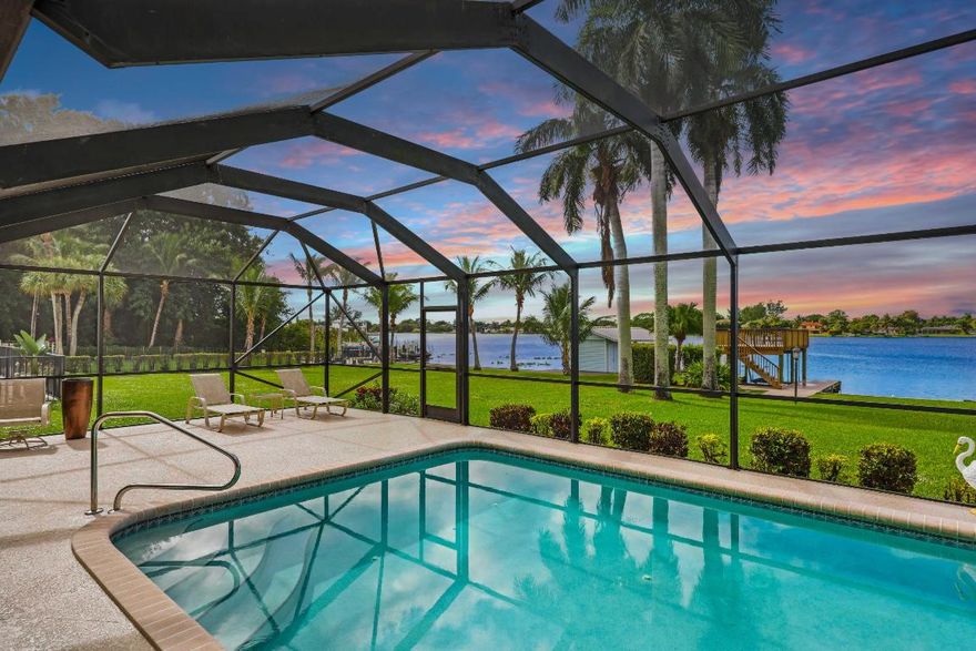 This Lake Osborne waterfront home is a boater's dream with your 2-story TimberTech dock ideal to cruise, paddle, or fish. The lift can accommodate up to a 25-foot boat, and the sun deck is the perfect spot for sunsets and watching the boat parades. Remodeled 4-bedroom 2 1/2 pool home is on 0.44 acres with a seawall, and has 180-degree water views. There are Brazilian teak hardwood & quality, engineered wood floors, crown molding, Bose surround sound & brand new metal roof. If you love to entertain, you will love the kitchen with granite, custom cabinetry, stainless steel appliances, & double ovens. Primary suite with Juliette balcony; morning kitchen, Jacuzzi tub, frameless glass shower, and dual vanity. Screened lanai, heated self-cleaning saltwater pool with new SunDek, tile & coping. Thoughtful upgrades show up in the details, including refined finishes, designer fixtures, and updated secondary bath spaces that keep the home feeling current. Custom hardware and upgraded stone selections add a high-end look you'll notice every day, and smart, practical touches support day-to-day ease.  All baths have been updated. The home was lovingly updated and has been well-maintained. 

If you desire an open layout, there are no bearing walls on 1st floor with clear span trusses. Any walls can be moved. The garage foundation footing was installed to support a 2nd floor addition, which is a huge plus. 

The dock has two 6,000 lb boat lifts and a 30' x 15' upper sun deck above. There is water and electric dockside. There's also 2 docking poles that accommodate a floating dock for sea-doo's or another boat. 

Outside of the headline features, the property includes lake-sourced irrigation for the yard, a multi-zone sprinkler setup, and panel shuttershelpful additions that many buyers appreciate in South Florida. Mature palms and well-kept landscaping frame the setting and give the outdoor areas a polished first impression.

The location is a big part of the lifestyle. You're a short drive to Lantana Beach and the Lake Worth Beach Pier, plus the dining and entertainment scenes in Downtown Lake Worth Beach, West Palm Beach and Delray Beach's Atlantic Avenue. Palm Beach International Airport and the Brightline is also an easy drive for travel days. Costco in Lantana is close for weekly runs.

For outdoor activities, John Prince Park is a short boat ride that offers a long list of options: trails, sports courts, a dog park, and open green space, making it a go-to spot for weekends. If you love golf, check out The Park.