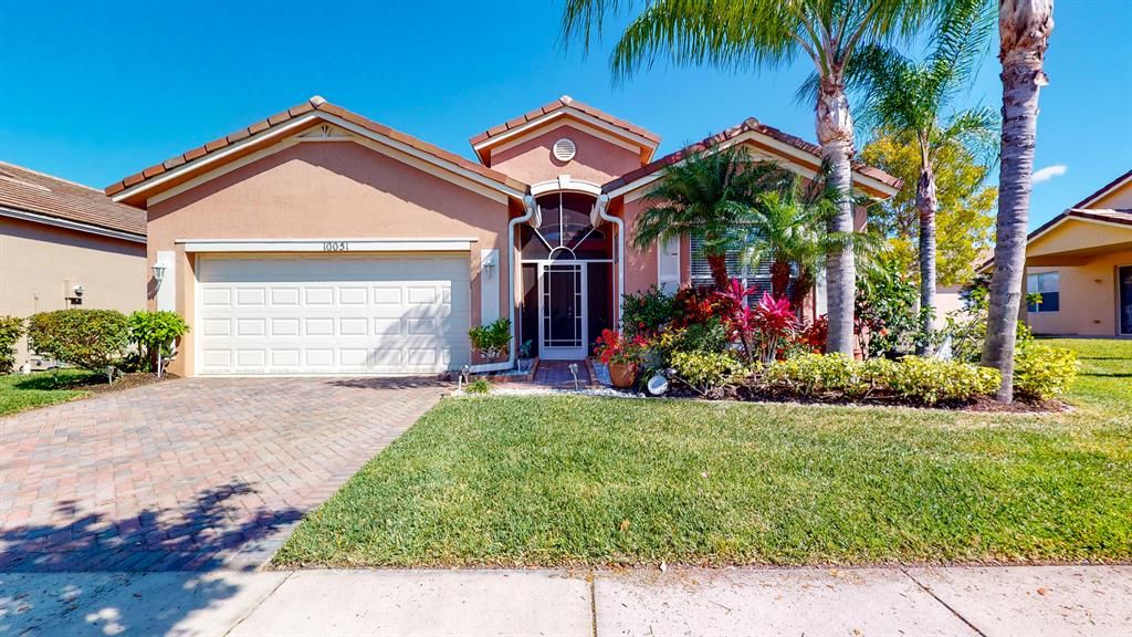 Photo of 10051 SW Chadwick Drive, Port Saint Lucie, FL 34987 (MLS # R10703263)
