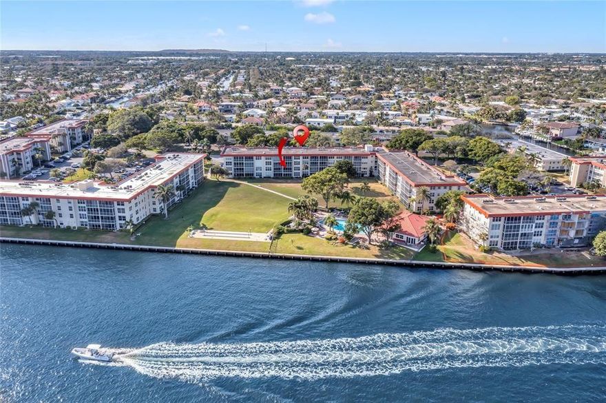 Experience waterfront living at its finest in this newly renovated 2 bedroom, 2 bathroom condo! Enjoy stunning intracoastal views from your spacious balcony, perfect for sipping coffee or dining as yachts glide by. This serene retreat features an open floor plan, fresh paint, upgraded flooring, impact windows, and a full size washer & dryer. Rent includes water, cable, internet, and trash for hassle-free living. Relax by the pristine pool overlooking the water, with ample guest parking available. Embrace luxury, tranquility, and breathtaking views- your perfect oasis awaits!