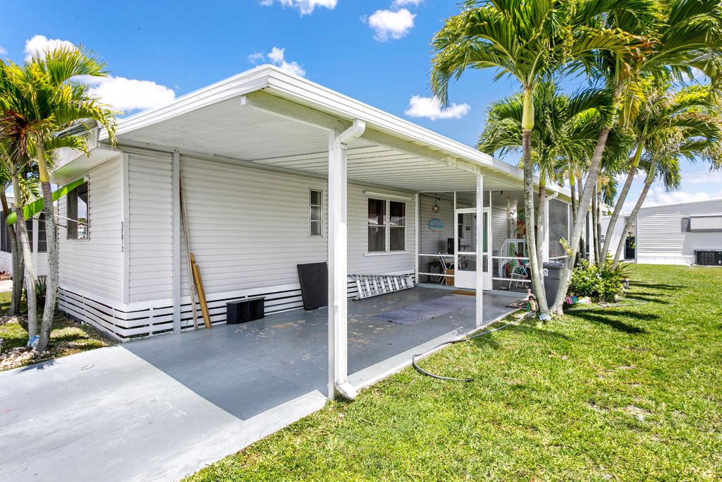 Photo of 37012 Exuma Bay, Boynton Beach, FL 33436 (MLS # B26019607)