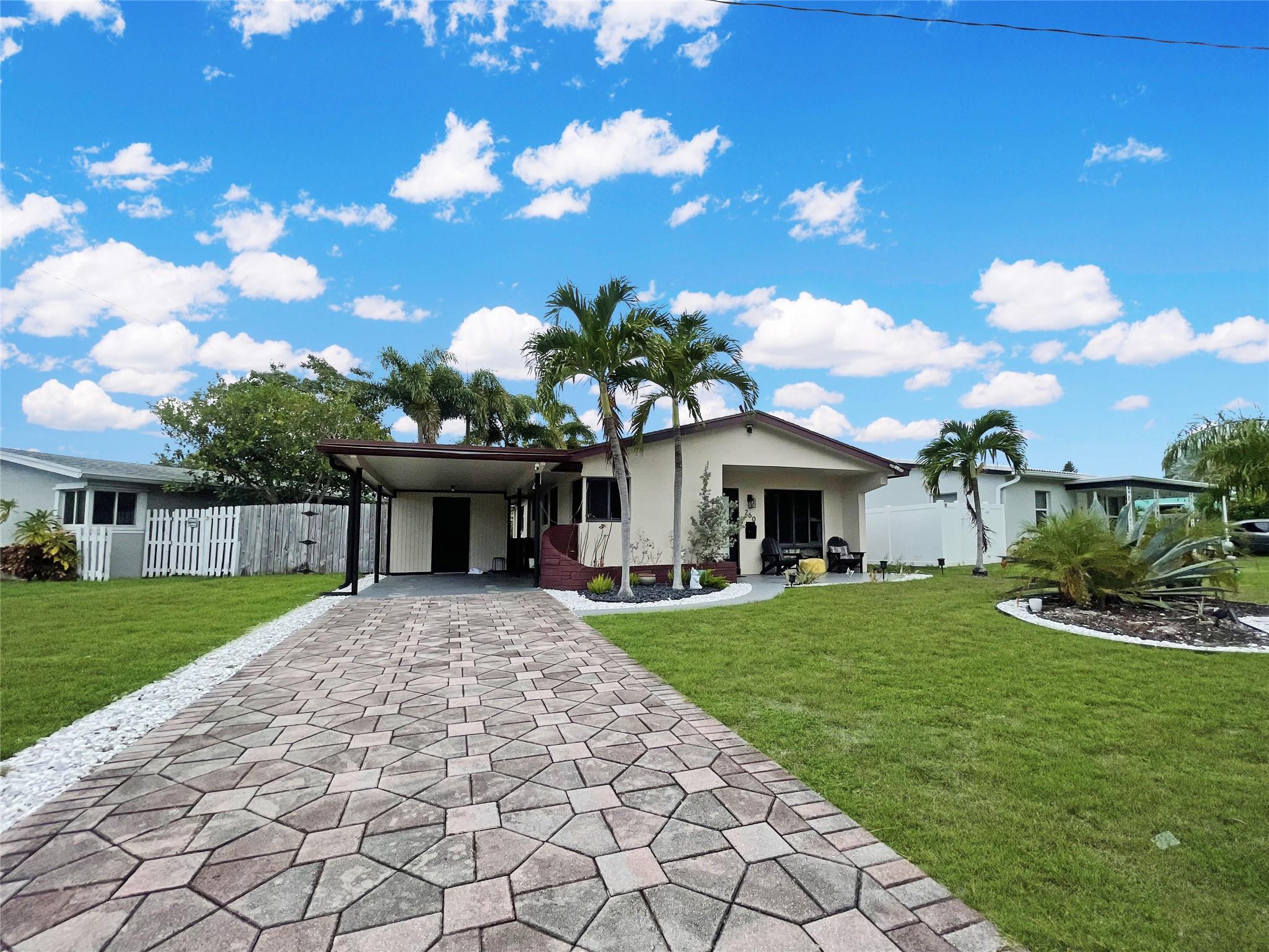 ***ALL NEW PVC SEWER LINES (which is RARE in this neighborhood)*** ROOF 2020 *** ALL IMPACT WINDOWS & DOORS *** TANKLESS WATER HEATER *** Welcome to this Fully Furnished 2B/1B single-family home, ideally situated in the heart of Oakland Park’s highly desirable North Andrews neighborhood. NO HOA! Also, perfect for INVESTORS or AIRBNB use. Just minutes from FTL Beach, I-95, Airport, Downtown Ft Lauderdale, Inter Miami Stadium, shopping, dining, & more- this location offers the best of South Florida living. Recent renovations include a modern kitchen, updated flooring, remodeled bathroom, and fresh exterior paint. Tastefully furnished, the property is move-in ready perfect for buyers seeking a turnkey opportunity. Spacious driveway & covered carport. EXTRA Laundry room outside for convenience