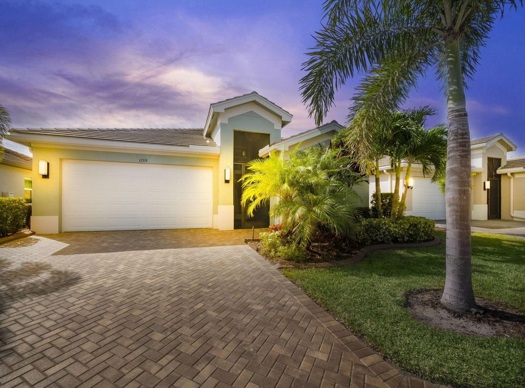 Photo of 11374 SW Carlisle Crossing Avenue, Port Saint Lucie, FL 34987 (MLS # R11030439)