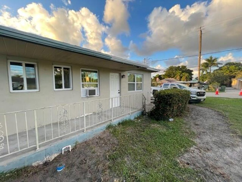 Photo of 3890 Lakewood Road #1, Palm Springs, FL 33461 (MLS # R10940626)