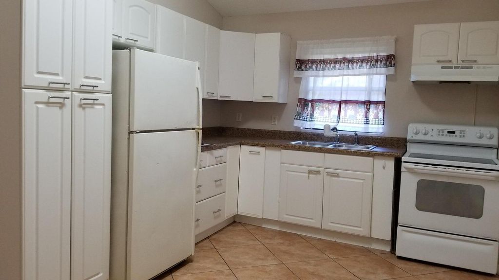 Photo of 12218 56th Place N #Guest House, Royal Palm Beach, FL 33411 (MLS # R11027223)