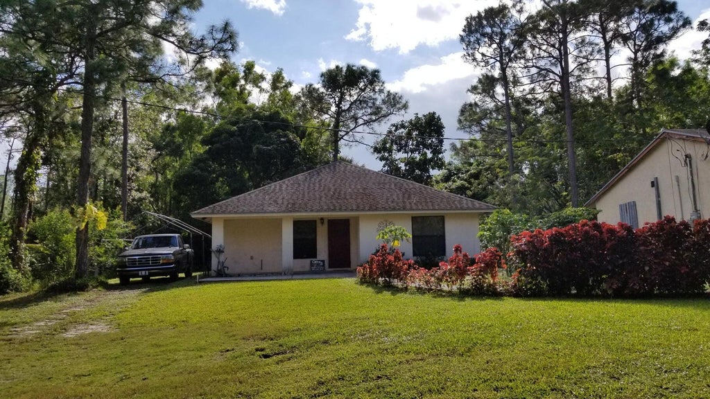 Photo of 12218 56th Place N #Guest House, Royal Palm Beach, FL 33411 (MLS # R11027223)