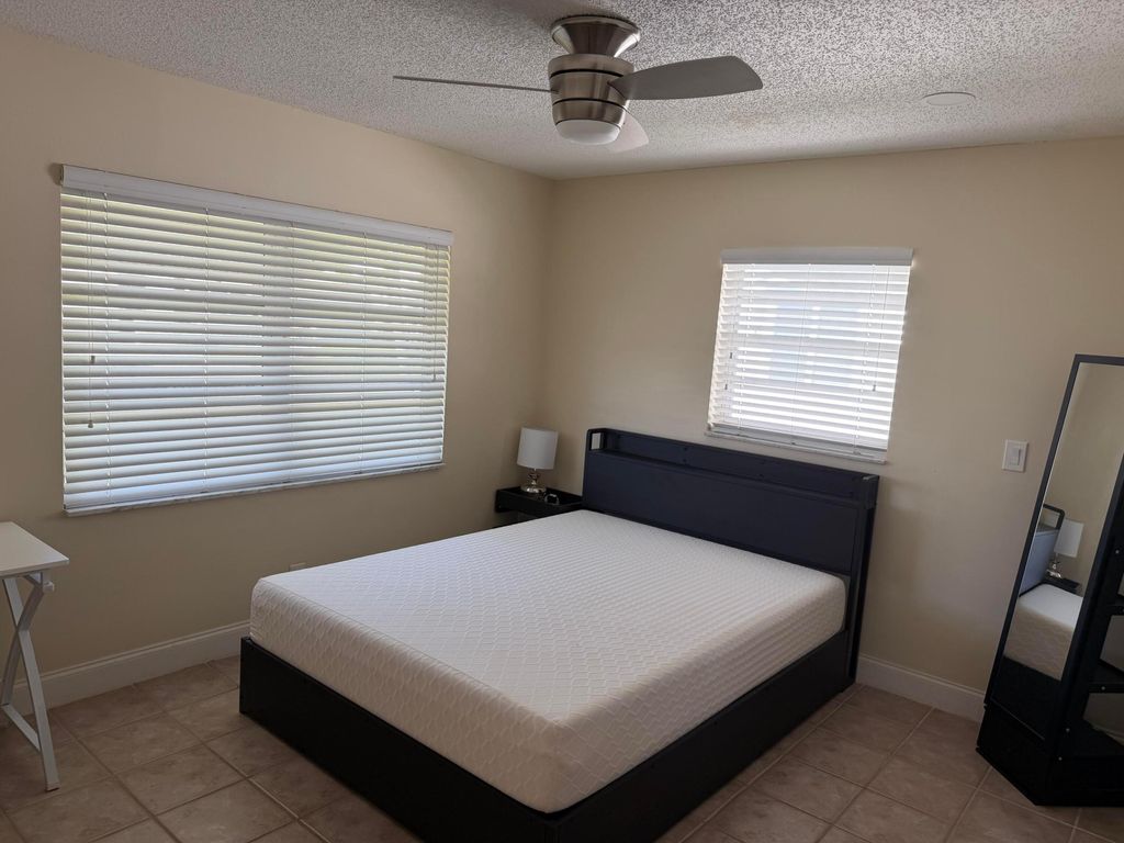Photo of 1904 SW 13th Way, Boynton Beach, FL 33426 (MLS # B26021709)