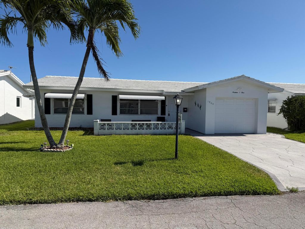 Photo of 1904 SW 13th Way, Boynton Beach, FL 33426 (MLS # B26021709)