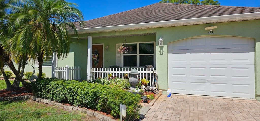 Photo of 453 NE Midvale Street, Port Saint Lucie, FL 34983 (MLS # R10990454)