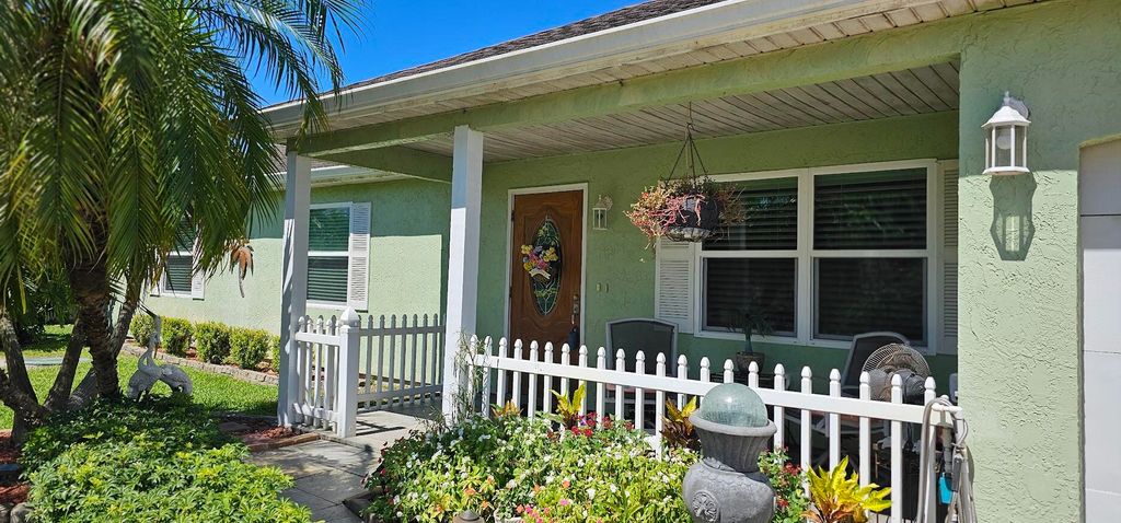 Photo of 453 NE Midvale Street, Port Saint Lucie, FL 34983 (MLS # R10990454)