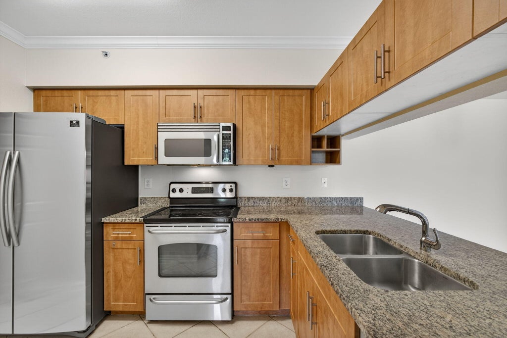 Photo of 6510 Emerald Dunes Drive #302, West Palm Beach, FL 33411 (MLS # R11107519)