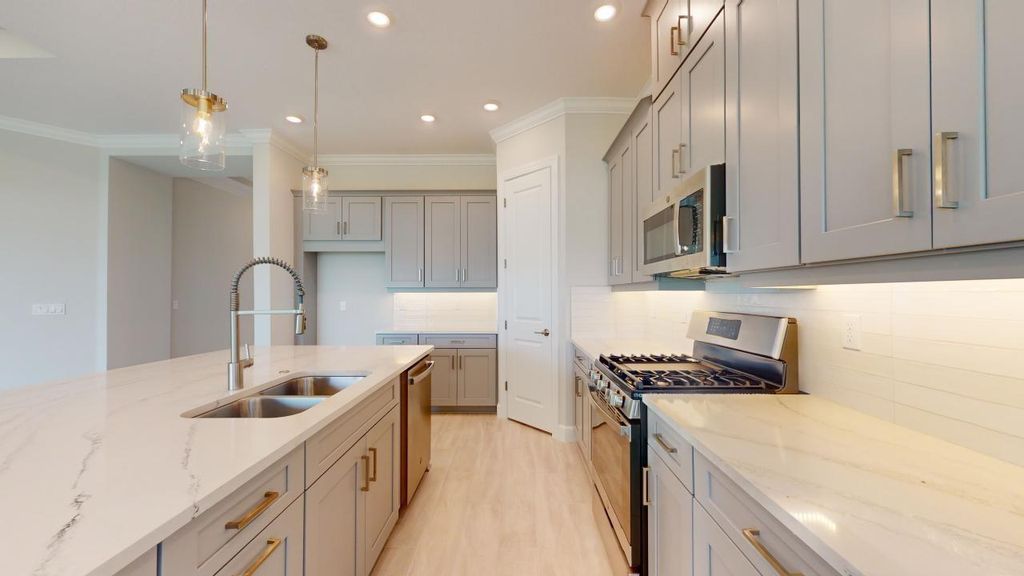 Photo of 10016 SW Cloister Drive, Port Saint Lucie, FL 34987 (MLS # F10416527)