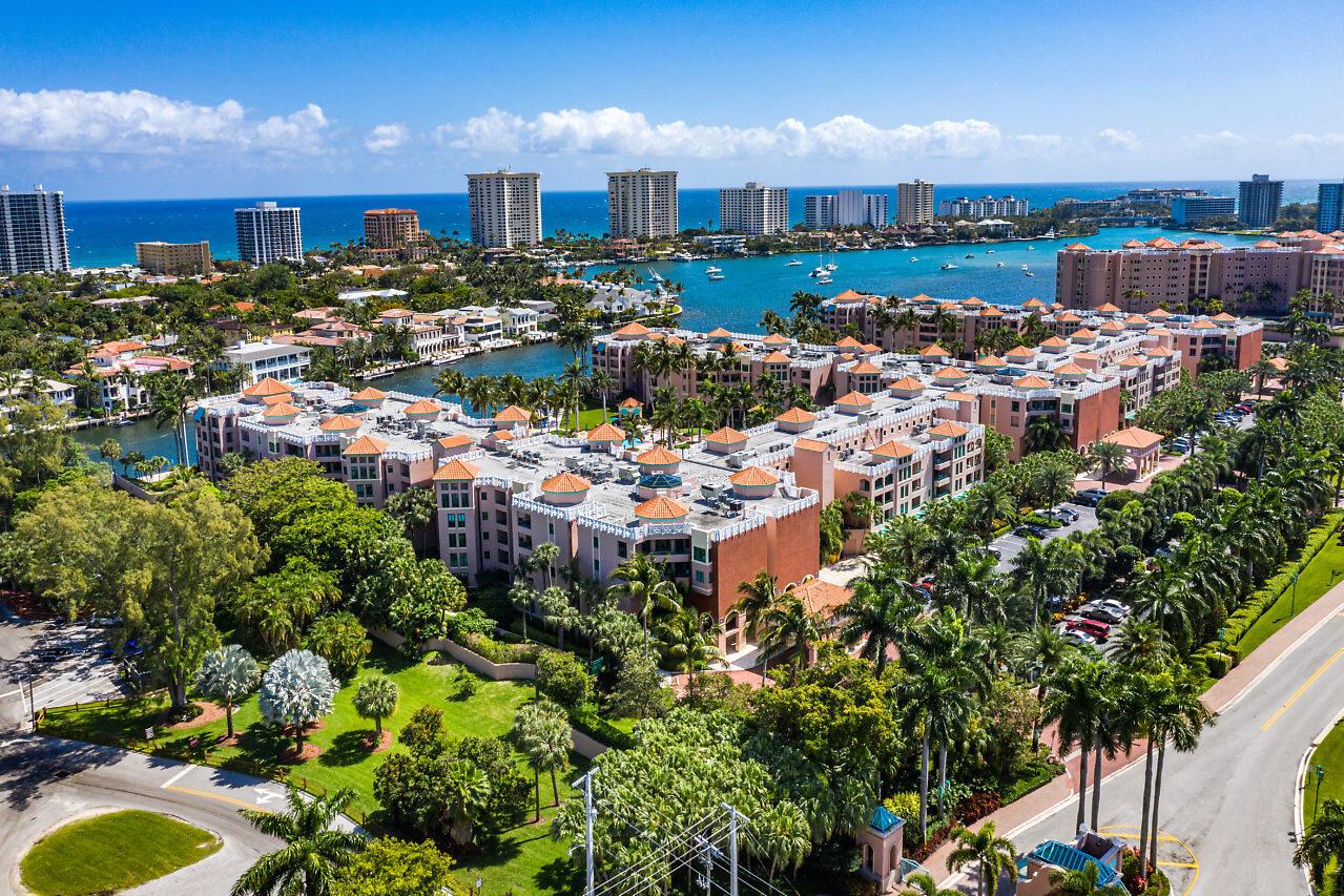 Furnished Annual Rental.. this elegant El Lago model showcases panoramic views of the Intracoastal Waterway and the lush tropical grounds of the Boca Raton Resort & Club. Designed with a desirable split 2BR/2BA layout, the residence offers an oversized family room, open kitchen with breakfast bar, and a cozy breakfast nook with built-in desk. The spacious primary suite features a large walk-in closet, soaking tub, and separate shower, while the guest suite provides balcony access, twin beds, generous closet space, and a pocket door for added privacy. Enjoy serene water and garden views from nearly every room. Available for annual lease only. Optional Boca Raton Club membership provides an exclusive lifestyle experience with access to world-class amenities (subject to additional costs).