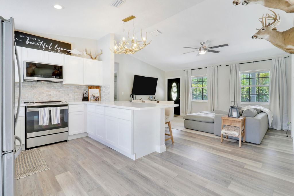 Photo of 17355 92nd Lane N, The Acreage, FL 33470 (MLS # R11005906)