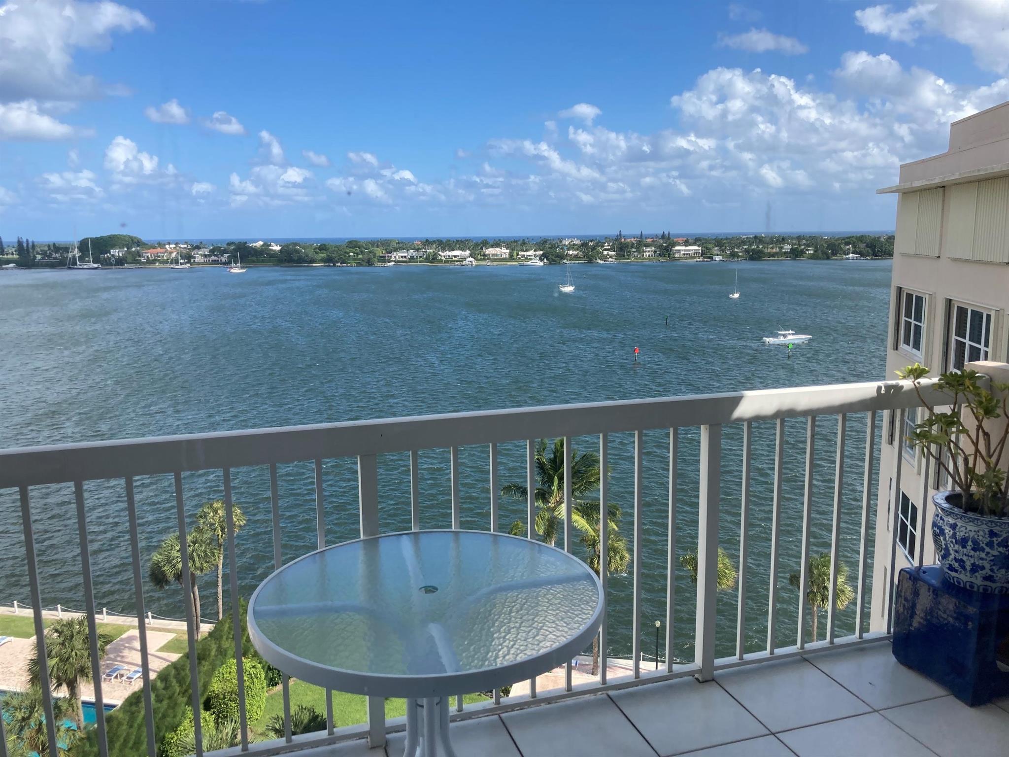 Portofino North Penthouse - A glamorous mid-century modern decorated designed 2 bedroom, 2 bath penthouse (primary has walk in shower/ guest has tub & shower). Located in West Palm Beach directly on the Intracoastal with views of Palm Beach and the Ocean. Watch yacht sail by the terrace. Enjoy the beautiful pool and the security of a gated condominium.