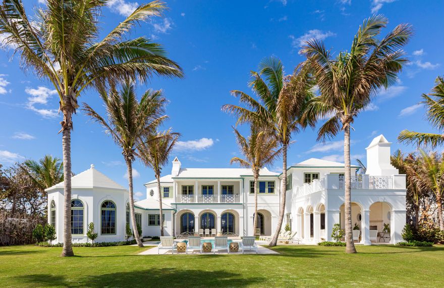 Presenting the only new custom home available on Palm Beach Island with one of the highest elevations, 175' of direct ocean front and on 1.14 acres. This Modern, Classic Bermuda inspired estate boasts over 18,000 SF. The spacious 7 bedroom home has views of the ocean from almost every room and includes gourmet dual kitchens, expansive living, dining, and entertaining areas, a private direct oceanfront office, and expansive loggias with endless ocean views. The basement includes a 4,000 bottle custom wine cellar, theater room with a bar, and professional grade fitness center. The   2 bedroom, 2 bath guest house has a gracious great room and terrace with garden views and gourmet kitchen. The grounds will include a private entry gate on North Ocean Boulevard that will open to a lushly landscaped and well-manicured compound with a stately pool and spa along the Atlantic Ocean. This one-of-a-kind estate is available as of February 2021. The home is being offered fully furnished and turnkey.