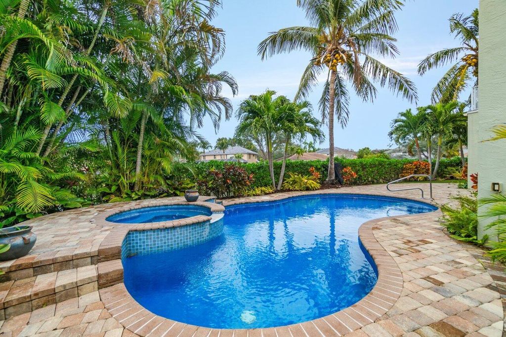 Photo of 257 N Spoonbill Lane, Jupiter, FL 33458 (MLS # R11056865)