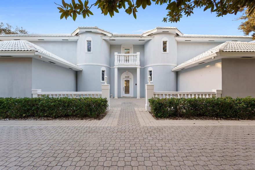 PRICE IMPROVEMENT! Welcome to exclusive gated community of Jupiter Hills. This gorgeous home features a large circular driveway with impressive curb appeal, oversize lot boasting almost 5000 sq ft of livable space, private garden area, split bedrooms and much more. Upon entering, you'll be welcomed by a grand two story foyer, with marble flooring and impressive columns. First floor features spacious master bedroom with full walk in closet and large bathroom.  Second bedroom is on ground floor with full bathroom. Upstairs features impressive entertainment space, with built in bar, easily converted into secondary master, media room, etc. Two other bedrooms both have full bathrooms. Golf course and private garden views. Club membership not mandatory 15k capital contribution req