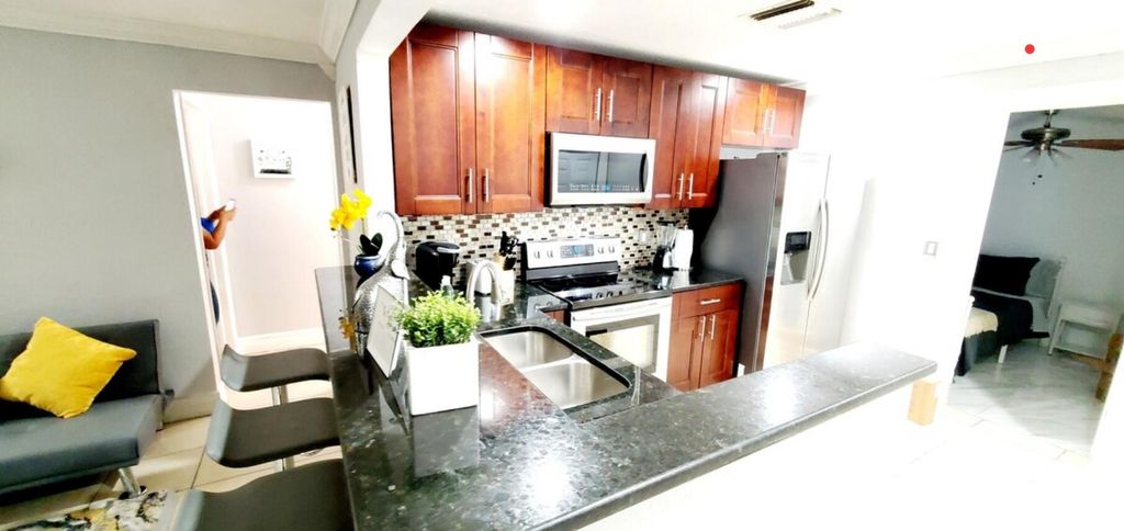 Photo of 518 El Prado, West Palm Beach, FL 33405 (MLS # R11104549)