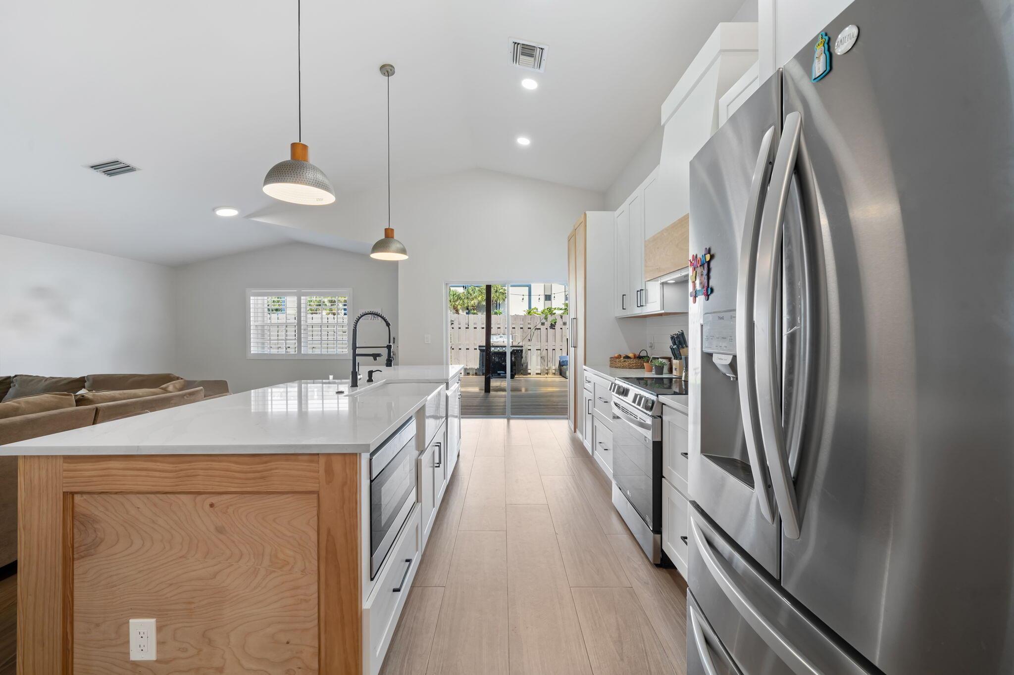 Welcome to your dream home located at 2540 NW 80th Ave, Margate, FL! This beautifully renovated 3-bedroom, 2-bathroom residence boasts stylish and comfortable living space, perfect for families and entertaining. Step inside to discover a modern interior adorned with high-quality finishes and thoughtful design elements. The spacious living area is filled with natural light, creating an inviting atmosphere for relaxation and gatherings. The open-concept kitchen features sleek cabinetry, stainless steel appliances, and elegant countertops, making it a chef's delight. Enjoy meals in the adjacent dining area or step outside to your private backyard oasis for al fresco dining in the Florida sunshine. Each of the three bedrooms offers ample space and comfort. The master suite