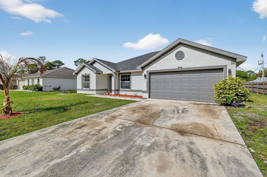 Photo of 1714 SE Aneci Street, Port Saint Lucie, FL 34983 (MLS # B26008657)