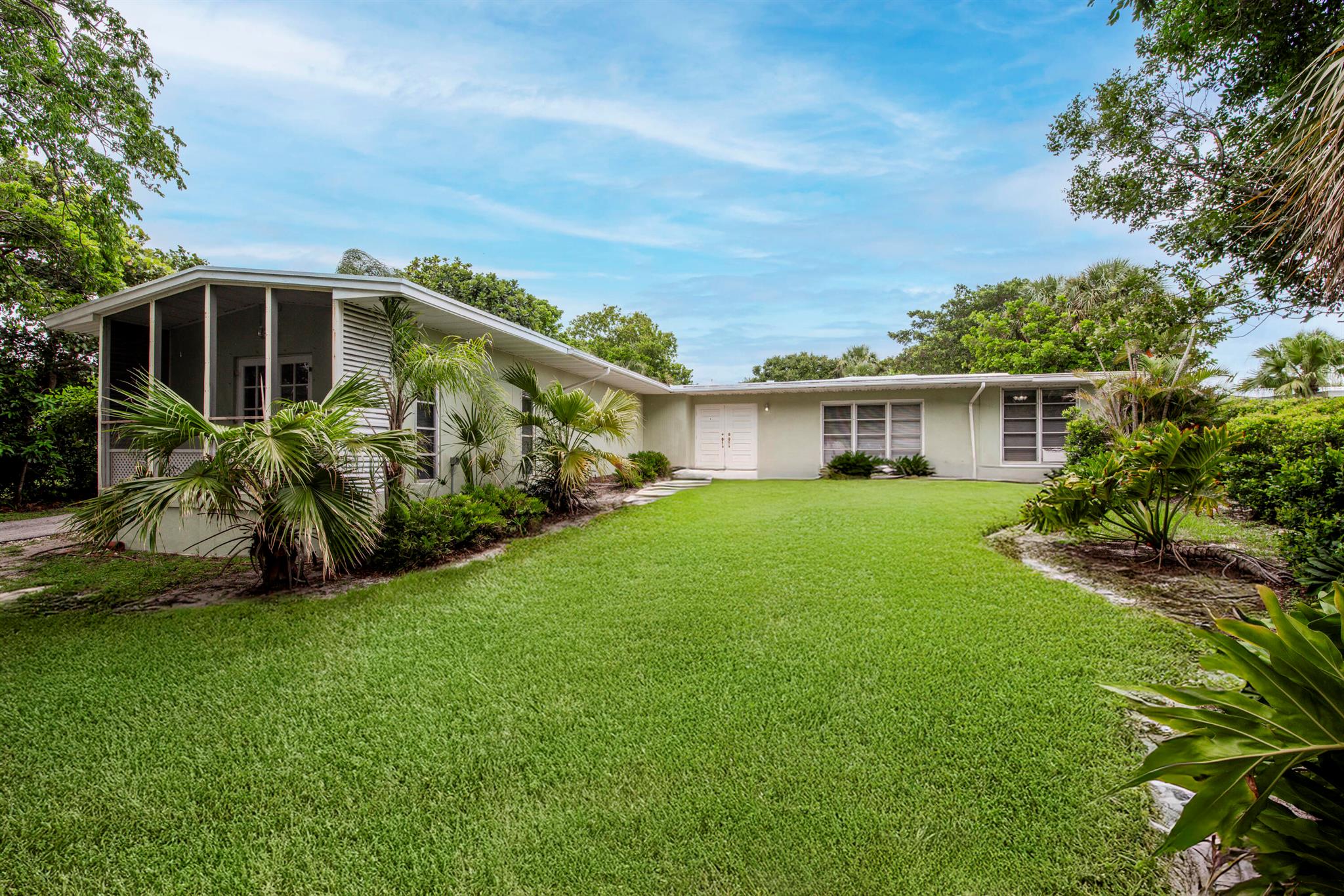 This beautiful Florida home features a unique and spacious layout with 3 bedrooms and 2 full bathrooms, offering both comfort and flexibility. Situated right on the Intracoastal, it boasts peaceful water views looking out toward Hutchinson Island. Enjoy a private pool surrounded by tropical landscaping, with lawn and pool maintenance included for added convenience. A rare rental opportunity that blends charm, space, and an unbeatable waterfront location.