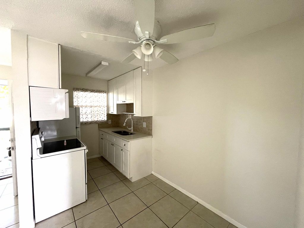 Photo of 801 S Federal Highway #108, Lake Worth Beach, FL 33460 (MLS # B26010820)