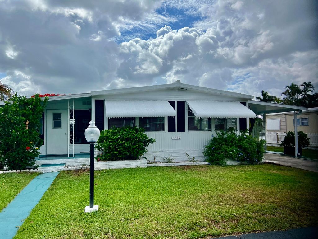 Photo of 6760 NW 45th Way #R-01, Coconut Creek, FL 33073 (MLS # R10992599)