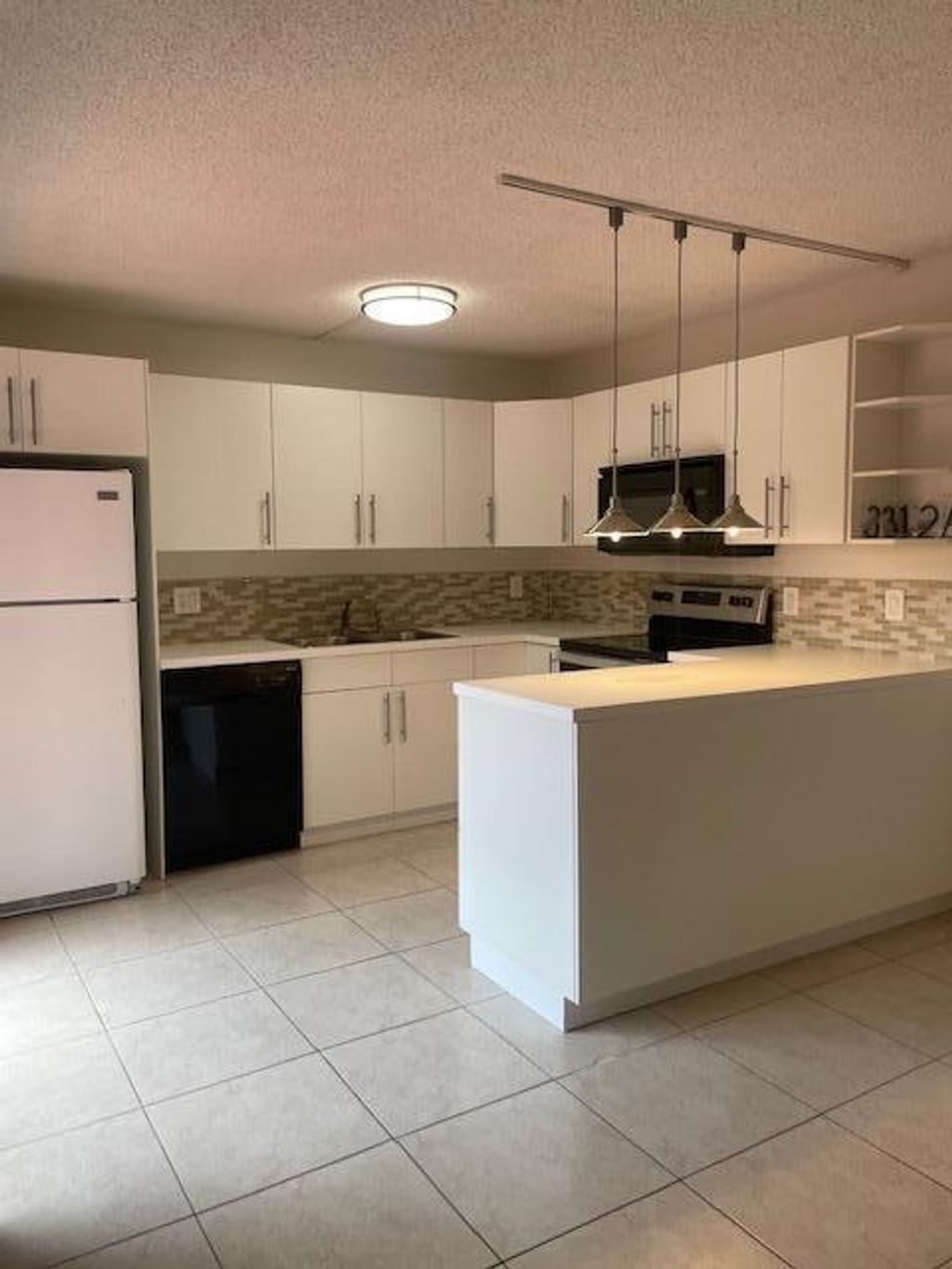 Photo of 3312 Spanish Wells Drive #47-A, Delray Beach, FL 33445 (MLS # R10995336)
