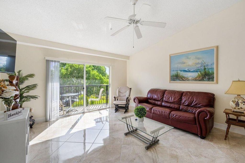 Photo of 1100 Crestwood Court #1110, Royal Palm Beach, FL 33411 (MLS # F10551374)