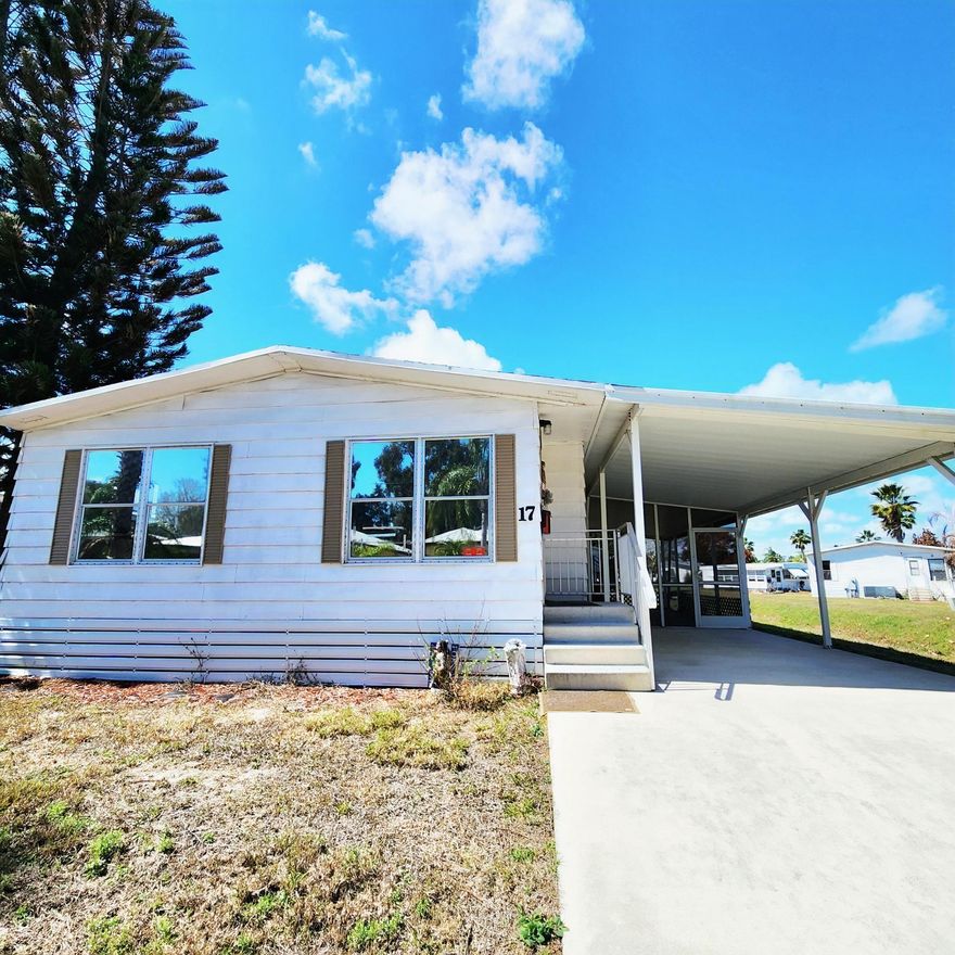 Charming, spacious 2bed/2bath home w/ beautiful water views. Roof 2020! Large screened in porch, perfect to watch the ducks & birds glide by. You will be pleased w/ this prime location; close to the beach, mall, grocery stores, shopping, post office, banks, hospitals & more. Lot lease 842.53 includes security, cafe, Clubhouse w/activities, lawn care, trash, free private golf course, bingo, heated pool, pickleball, tennis, workshop, shuffleboard, bocce, gym, library, cards, Mahjong, clubs & more! Grab your slice of paradise in the highly desired town of Port St Lucie!