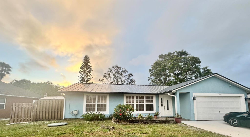 Photo of 1872 SW Hampshire Lane, Port Saint Lucie, FL 34953 (MLS # R11046047)