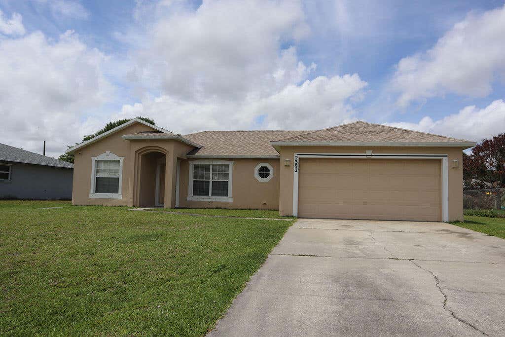 Photo of 2392 SE Stonecrop Street, Port Saint Lucie, FL 34984 (MLS # B26030739)