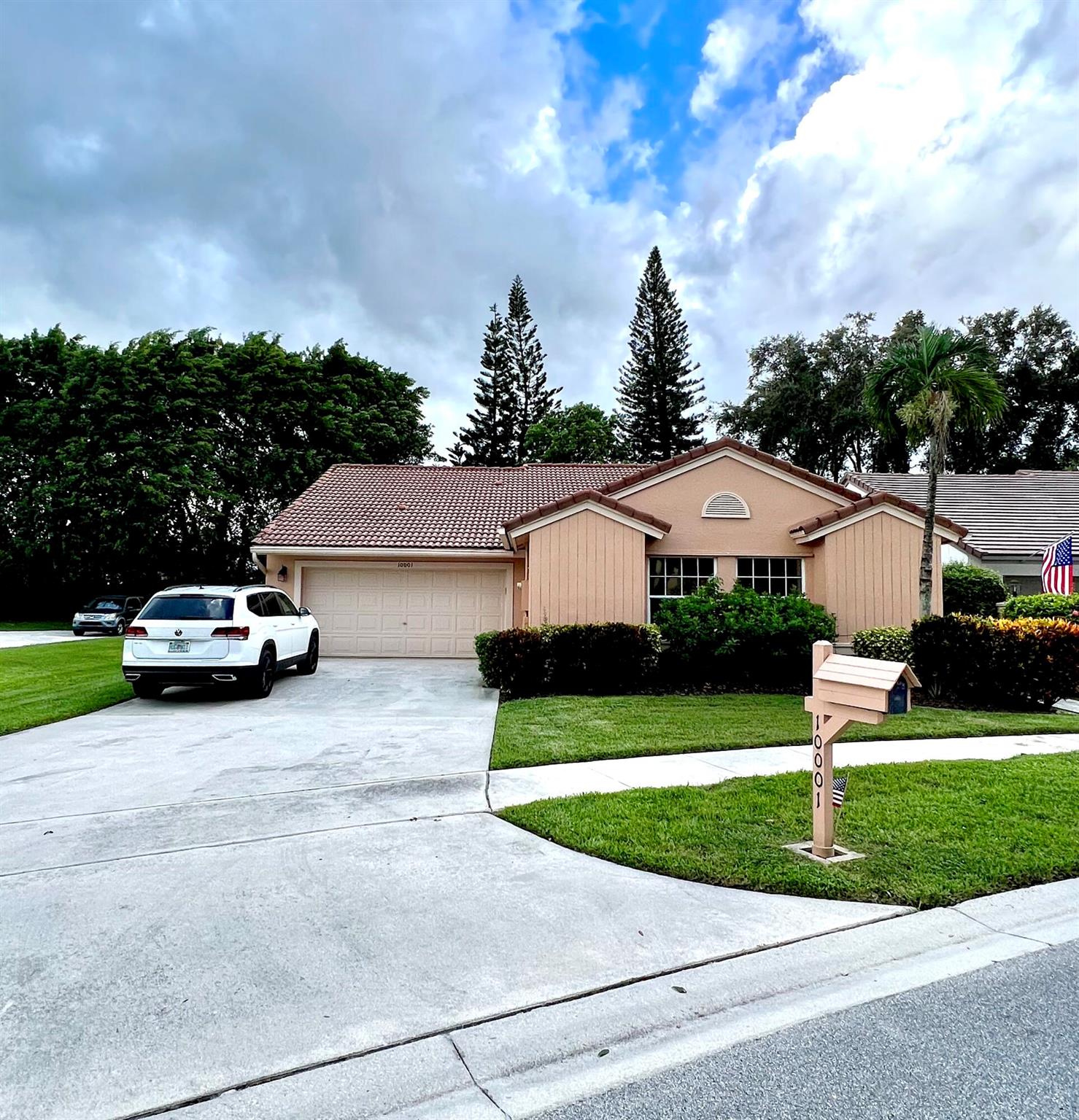 Nestled in the sought after Boca Springs neighborhood, this 3 bedroom, 2 bath home sits on a corner lot in a great location within the community. Inside, you'll find high ceilings that create a spacious feel, and an open floor plan with lots of natural light. The covered screened-in patio is a great spot to relax and leads to a private yard, perfect for outdoor activities. The floor plan is split, with the main bedroom in the back of the home. This bedroom features a spacious walk-in closet and double sinks in the bathroom. There is also a two-car garage with an oversized driveway. The community amenities are only a short walk away. There is a pool for a refreshing swim, a playground for the kids, and tennis, basketball, and volleyball courts for additional fun. Must see!