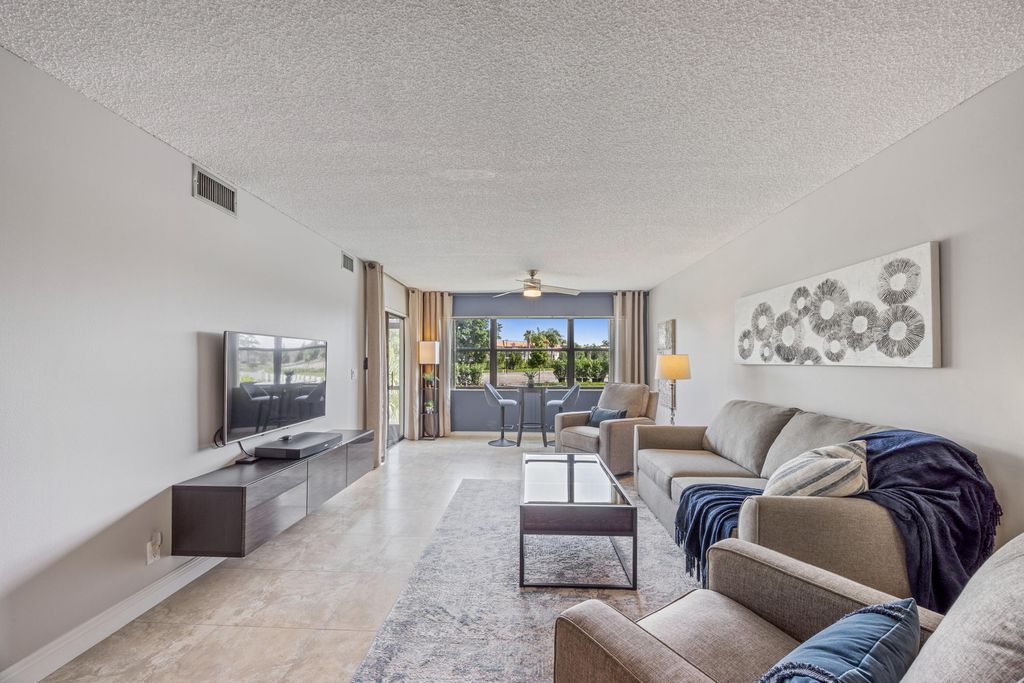 Photo of 7649 Tahiti Lane #103, Lake Worth, FL 33467 (MLS # R11158477)