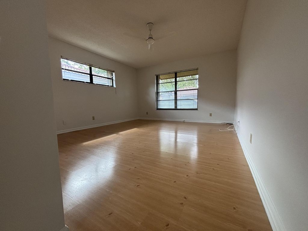 Photo of 9830 Bischofia Tree Way #B, Boynton Beach, FL 33436 (MLS # B26013769)