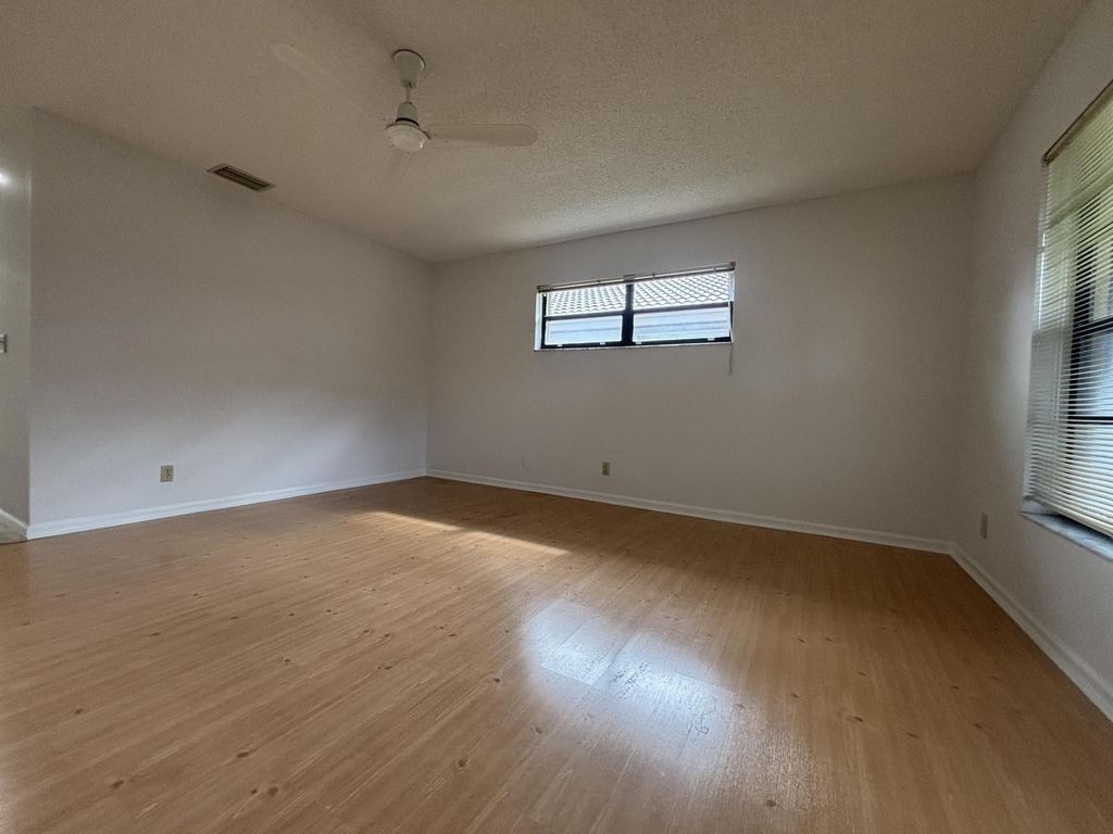 Photo of 9830 Bischofia Tree Way #B, Boynton Beach, FL 33436 (MLS # B26013769)