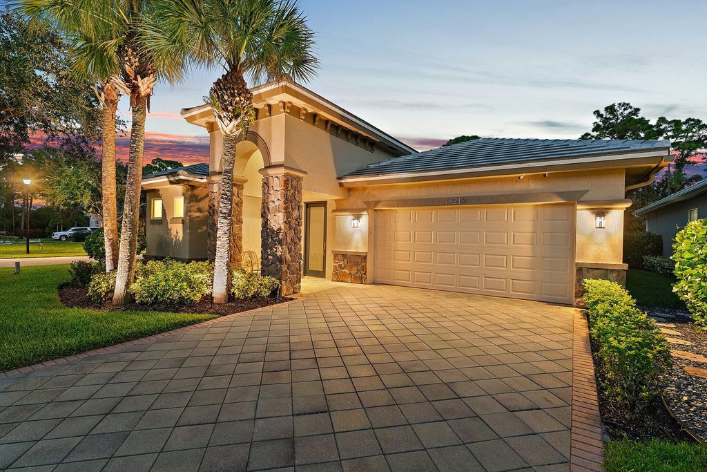 Photo of 11219 Osprey Lake Lane, Palm Beach Gardens, FL 33412 (MLS # R11119347)