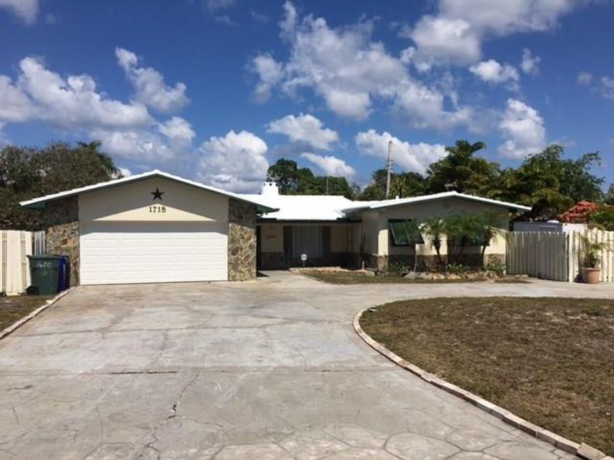 Large home on large lot with a pool! Pack your bags and move right in. This  home has large rooms, tile floors, large kitchen with spacious cabinets, 4 large bedrooms with spacious closets and 3 bathrooms. This home has attached 1 bedroom unit with separate electrical for in laws or extra income. The home has been updated in 1985. Please bring all reasonable offers. OWNER FINANCING AVAILABLE!