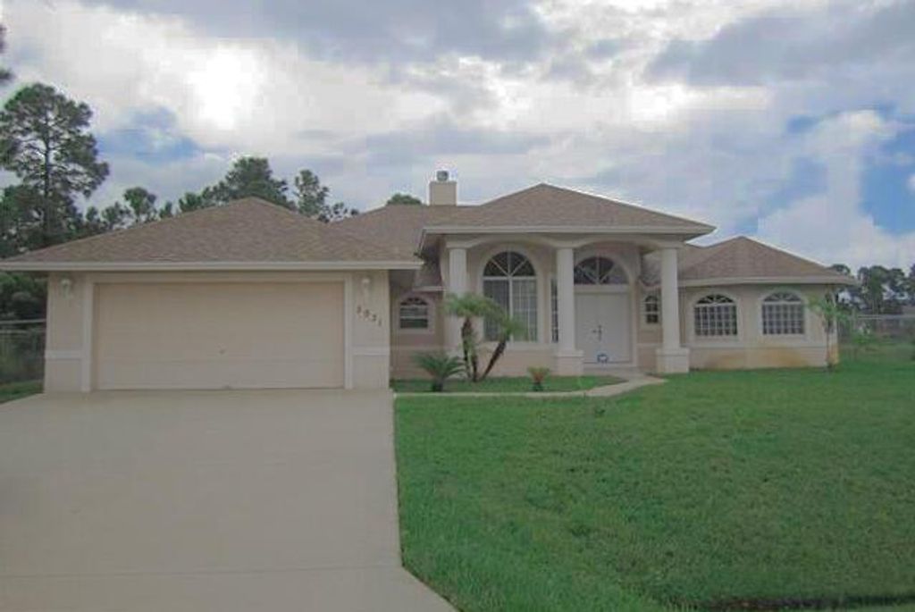 Photo of 5931 NW Foust Circle, Port Saint Lucie, FL 34986 (MLS # R10762620)