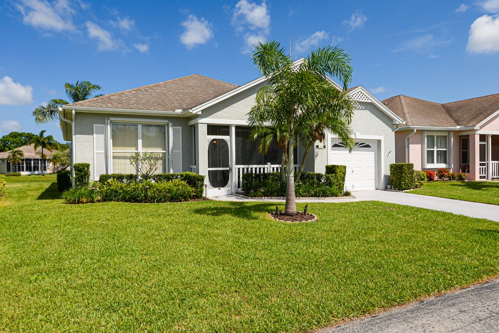 Photo of 1024 NW Tuscany Drive, Port Saint Lucie, FL 34986 (MLS # R10998265)