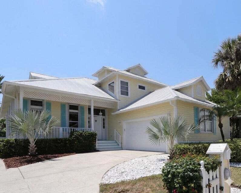 Photo of 400 Seaside Lane, Juno Beach, FL 33408 (MLS # B26052793)