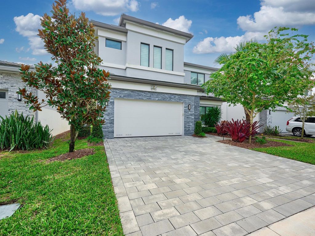 Photo of 8790 Quiet Inlet Lane, Boca Raton, FL 33496 (MLS # R10971349)