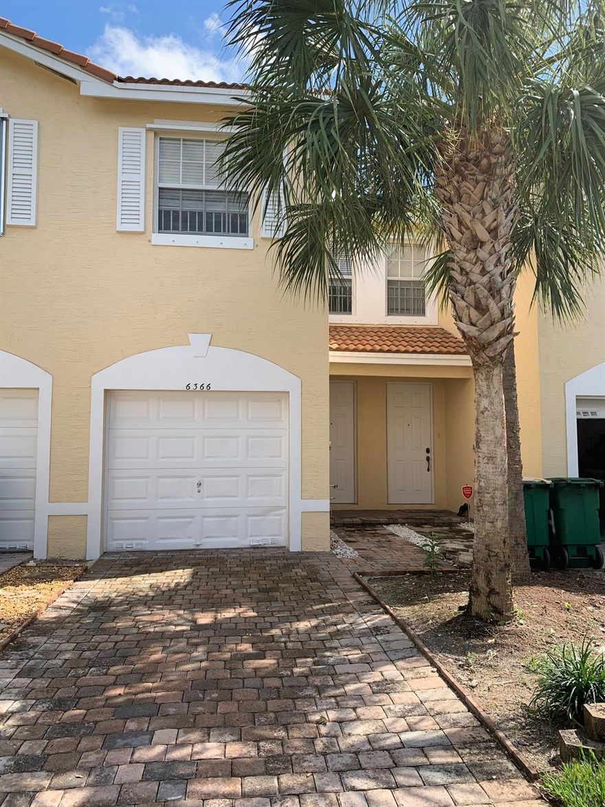 Great location for this great townhouse 3 bedrooms and 2.5 bathrooms with full size washer and dryer in the unit and one car garage. Freshly painted throughout. Tile floors downstairs and carpet upstairs. Close to shopping, banking, dinning, public transportation, etc. Community has a pool and open green space behind the townhouse. Ready to rent and move in. Must apply to HOA for approval.