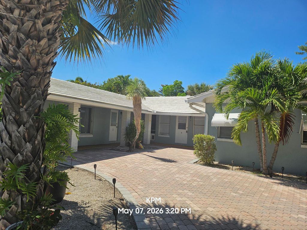 Photo of 115 Bravado Lane, West Palm Beach, FL 33404 (MLS # B26027039)