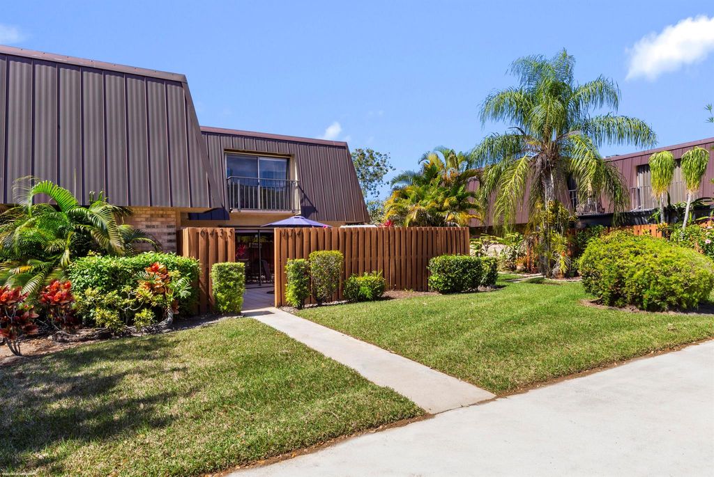 Photo of 6435 SE Windsong Lane #114, Stuart, FL 34997 (MLS # R11146050)