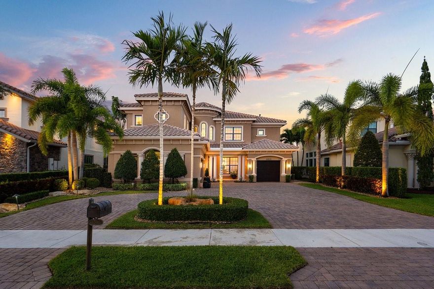 Experience resort style living in this lakefront Parkland Golf & CC home. 5 beds/5.5 baths, 3 car garage, 1,000 bottle wine room, large chef's kitchen with oversized island, double oven, 6 JennAir gas burner, designer finishes like custom millwork, natural stone, plantation shutters & luxury wall coverings. Relax or entertain in a private oversized backyard, w/custom designed pool & spa, newly expanded 32'x16' lanai w/12' ceiling, summer kitchen, landscaping, lighting, fire pit & waterfall. Whole house 30KW gas generator. 2 newer HVAC 26 SEER units. Honed marble finished & hardwood floors. High eff natural gas HWH. Upgrades galore & move in ready. See attached. PGCC offers tennis, pickleball, fitness center, restaurants & bars, Kids Club, and more. Golf membership is separate & optional.